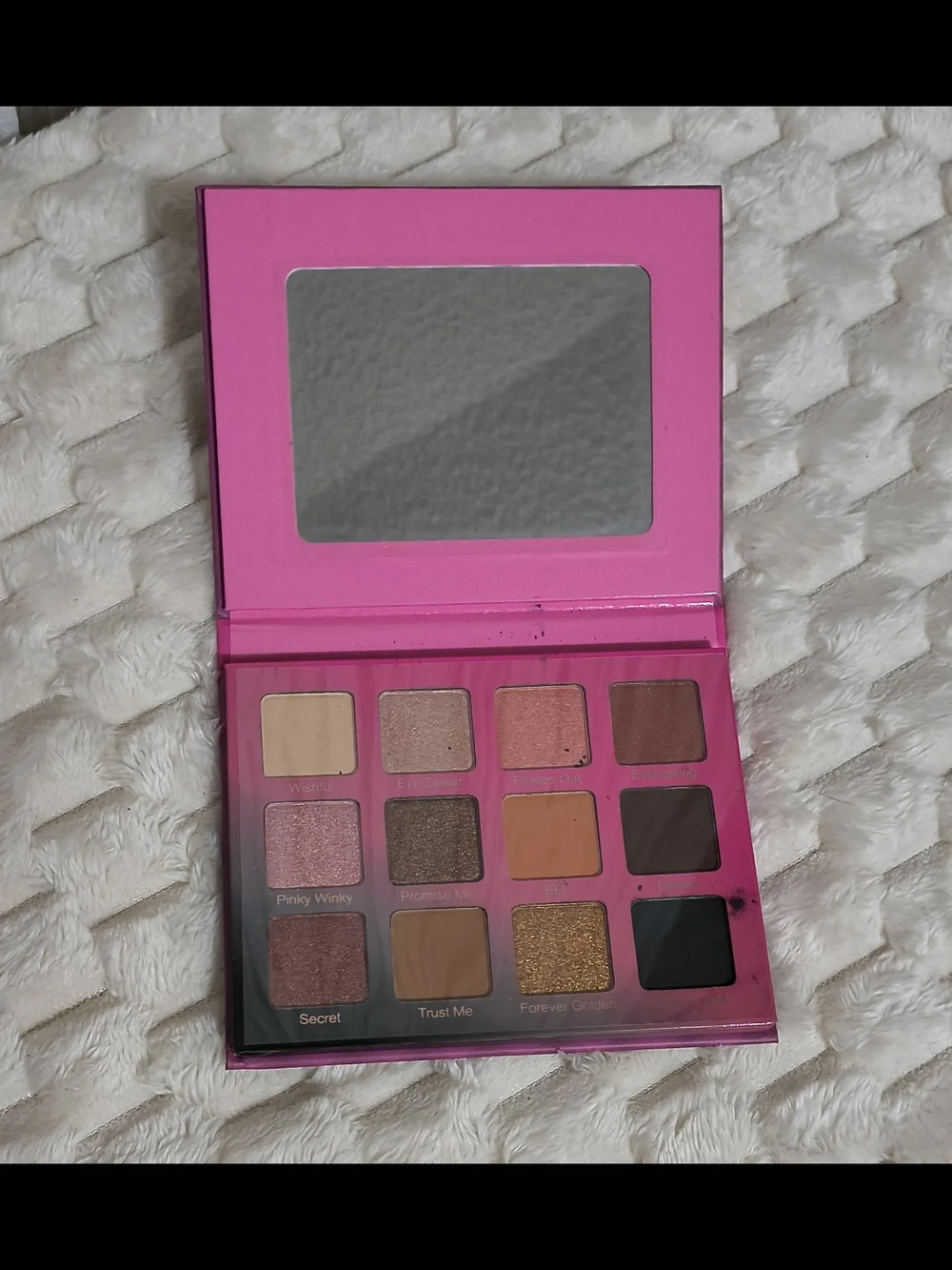 Pinky Promise boxed product on textured surface
